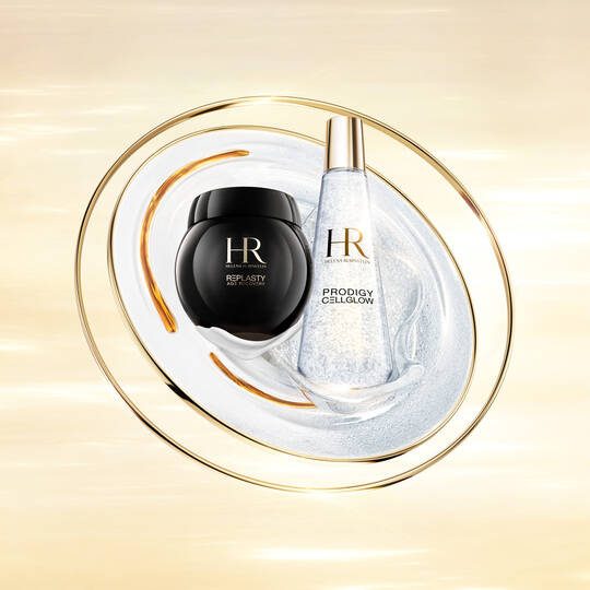 Image of Age Recovery night and Prodigy Cellglow Dewy Essence, presented on a swirling cream and gold background, for 6.18 animation.​